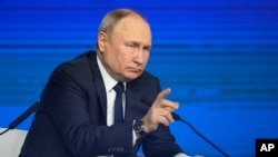 Russian President Vladimir Putin speaks during a meeting with his election campaign activists in Moscow, Jan. 31, 2024. Presidential elections are scheduled in Russia for March 17.