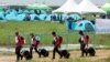 Peserta Jambore Pramuka Dunia ke-25 tiba di lokasi perkemahan di Buan, Korea Selatan, 1 Agustus 2023. (Foto: Yonhap via REUTERS)