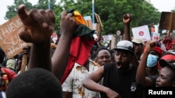 Ghanaians gather for a third day of anti-government protests amid police arrests and obstruction in Accra, Ghana, Sept. 23, 2023.