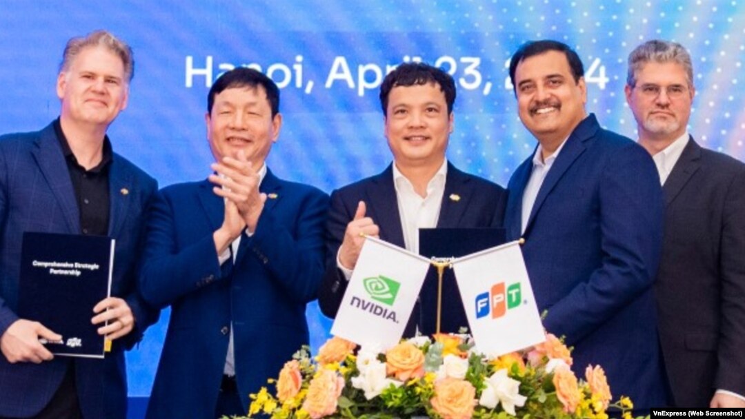 Đại diện của FPT và Nvidia tại lễ ký kết hợp tác giữa ởchị Hà Nội hôm 23/4.