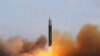 North Korea's Kim Vows to Respond to Nuclear Threats, Oversees Missile Test 