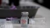 FILE - A vial of the Moderna COVID-19 vaccine is seen at an ambulance company in Santa Fe Springs, California, Jan. 9, 2021. 