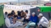 Security Concerns Leave Afghan Evacuees Stuck in Balkan Camp 