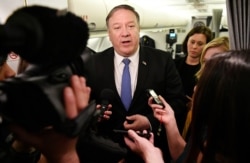 FILE - U.S. Secretary of State Mike Pompeo speaks to reporters in flight en route to Baghdad, Iraq, May 8, 2019.