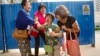 Chinese Family Members Question Motive Behind MH370 Declaration 