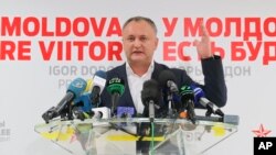 Moldovan presidential candidate Igor Dodon speaks to the media after voting ended in the presidential elections, in Chisinau, Moldova, Nov. 13, 2016. Dodon has been eager to scrap an EU association agreement in favor of a trade deal with Moscow.