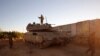 Tentara Israel mengambil posisi dekat permukiman Israel, Shtula, di perbatasan dengan Lebanon, Rabu, 19 Mei 2021. 