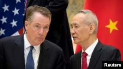 Le représentant américain au Commerce, Robert Lighthizer et le vice-Premier ministre chinois Liu He, à Beijing, Chine, le 15 février 2019. Mark Schiefelbein / Pool via REUTERS