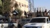 Under Fire, IS Struggles to Hold Raqqa