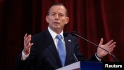 Australian Prime Minister Tony Abbott speaks during the launch of a student mobility program at a university in Mumbai, India, Sept. 4, 2014. 