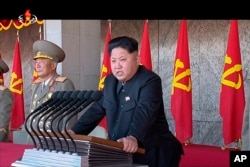 FILE - North Korean leader Kim Jong Un delivers a speech during the ceremony to mark the 70th anniversary of the country's ruling party in Pyongyang, Oct. 10, 2015.