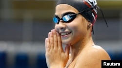 La réfugiée syrienne Yusra Mardini, 18 ans, participante aux Jeux Olympiques de Rio, 1er août 2016 (Reuters/ Michael Dalder)