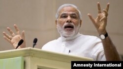 FILE - Indian Prime Minister Narendra Modi speaks during conference by The Environment Ministry, New Delhi, April 6, 2015.
