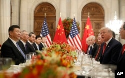 President Donald Trump with China's President Xi Jinping during their bilateral meeting, Dec. 1, 2018 in Buenos Aires, Argentina.