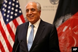 Special Representative for Afghanistan Reconciliation Zalmay Khalilzad approaches the microphone to speak on the prospects for peace, Feb. 8, 2019, at the U.S. Institute of Peace, in Washington.
