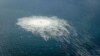 Kebocoran gas dari pipa gas Nord Stream 2 terlihat di lepas pantai pulau Bornholm, di Laut Baltik, Denmark Selasa (27/9). 