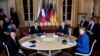 Poutine et Zelenski conviennent à Paris d'un échange de prisonniers
