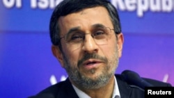 FILE - Mahmoud Ahmadinejad talks during a news conference at the end of his visit to Cairo, Egypt, Feb. Feb. 7, 2013.