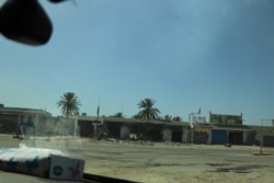 War has displaced more than 100,000 people, leaving charred buildings and abandoned neighborhoods in Tripoli's suburbs, July 7, 2019. (H.Murdock/VOA)