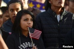 FILE - Latino leaders and immigration reform supporters gather on University of Colorado campus to launch a 12-month voter registration campaign to mobilize Colorado's Latino, immigrant and allied voters, Oct. 28, 2015.