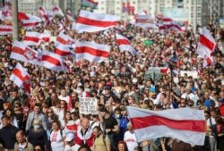 Opposition supporters take part in a rally against police brutality following protests to reject the presidential election results in Minsk, Belarus, Sept. 13, 2020. (Tut.By via Reuters)