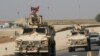 Américain tué en Irak: les représailles américaines font 19 morts dans les rangs des pro-Iran
