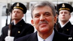 FILE - Turkey's Former President Abdullah Gul. Gul, a longtime ally of President Tayyip Erdogan also expressed concern about the new emergency decree, in a rare show of opposition. 
