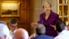 May Wins Support from Divided UK Government on Brexit Plan