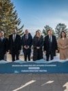 Group photo of top diplomats from Britain, Canada, France, Germany, Italy, Japan, and the United States meeting in Charlevoix, Quebec. (Courtesy: G7)