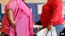 FILE - New government figures released Oct. 13, 2017, showed the adult obesity rate rose to about 40 percent, from just less than 38 percent.