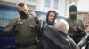 Masked Men Detain Female Protesters in Belarus