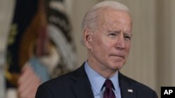 President Joe Biden speaks about the economy in the State Dinning Room