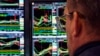A specialist works at his post on the floor of the New York Stock Exchange on March 12, 2025.