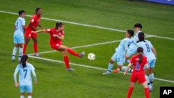 Alex Morgan marque contre la Thaïlande au Stade Auguste-Delaune de Reims, en France, le 11 juin 2019 