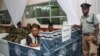 Un policier au centre Tally à Blantyre, le 24 mai pendant un briefing May 24, 2019, 