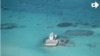 衛星圖片顯示中國在美濟礁建造人工島