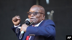 Former South African President Jacob Zuma addresses supporters outside the High Court in Pietermaritzburg, South Africa, May 26, 2021 where he faces charges of corruption. 