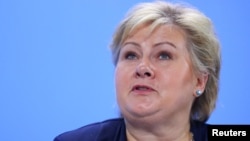 FILE - Norway’s Prime Minister Erna Solberg attends a press conference after a meeting at the Chancellery in Berlin, Germany, June 29, 2017. Solberg will be in Washington this week to meet with President Donald Trump.