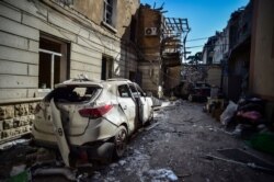 The scene of damage a day after shelling by Armenian's artillery during fighting over the separatist region of Nagorno-Karabakh, in Ganja, Azerbaijan, Oct. 12, 2020.