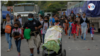 Foto de archivo de la primera caravana de migrantes de 2021, realizada a inicios de enero y compuesta por miles de habitantes de países del Triángulo Norte de Centroamérica y México.