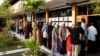 Malaysians Vote in Election Defined by Scandal, Tax