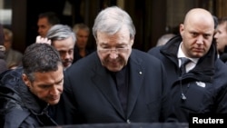 Australian Cardinal George Pell leaves at the end of a meeting with the victims of sex abuse, at the Quirinale hotel in Rome, Italy, March 3, 2016.