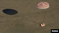 The Soyuz MS-07 spacecraft is seen as it lands with Expedition 55 crew members Anton Shkaplerov of Roscosmos, Scott Tingle of NASA, Norishige Kanai of the Japan Aerospace Exploration Agency Zhezkazgan, Kazakhstan, June 3, 2018.